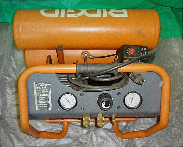 RIDGID Twin Stack Oil-Free 4.5 Gal Portable Air Compressor. Model OF45150